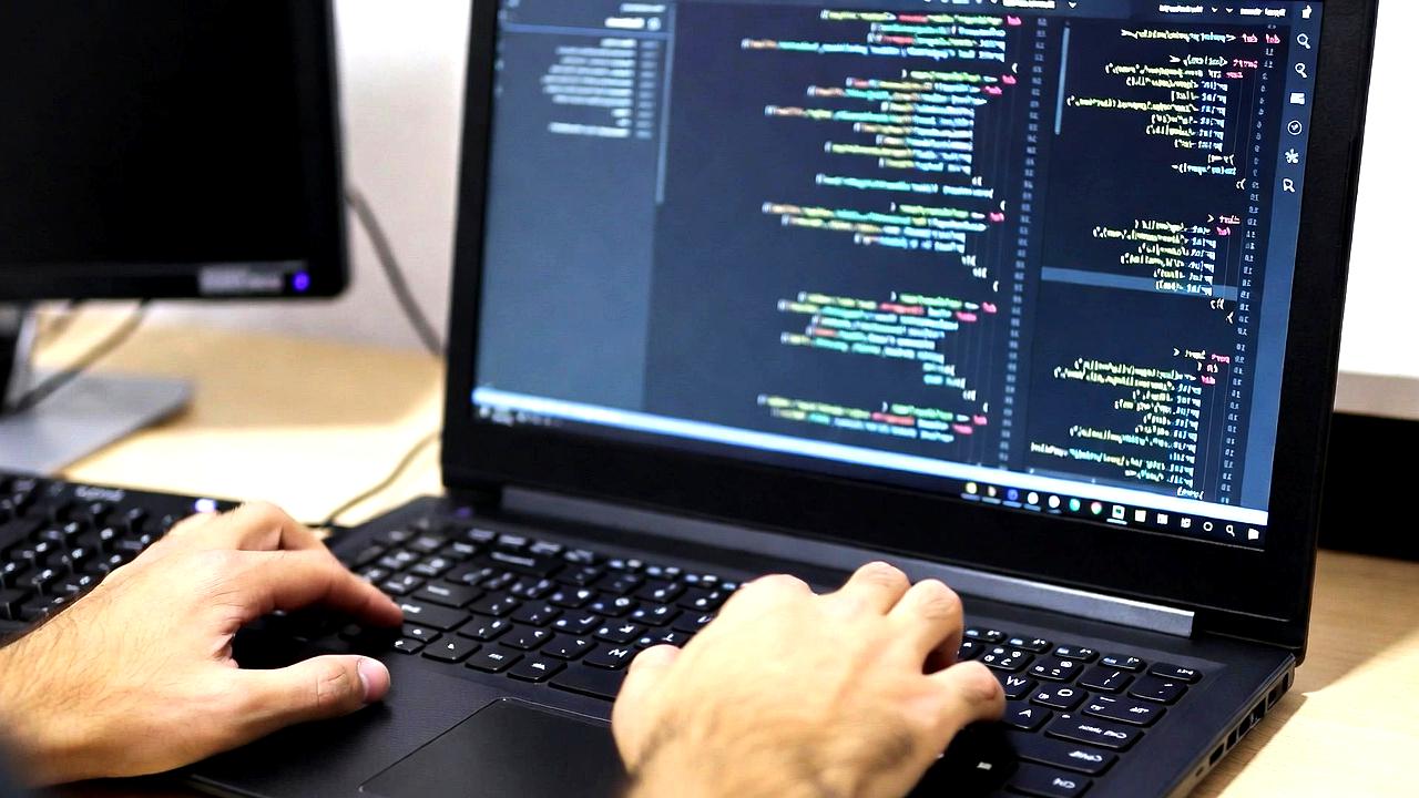 バイブコーディングとAIコード生成が開発現場に与える変化を示す抽象イメージ
