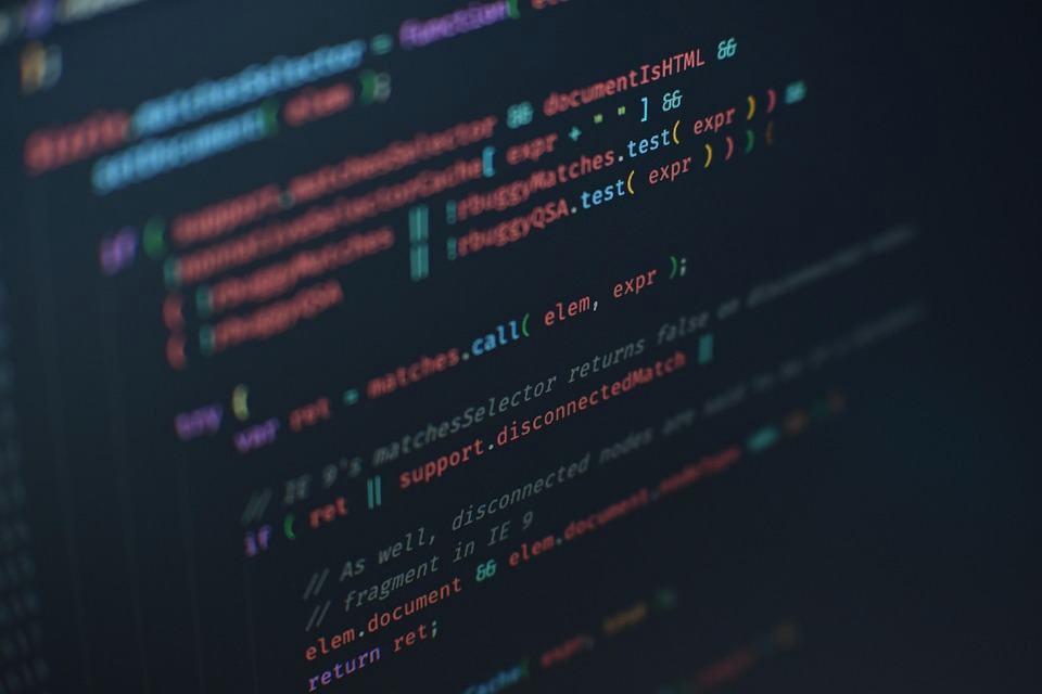複雑なGitのブランチ図とストレスを感じる開発者のイラスト