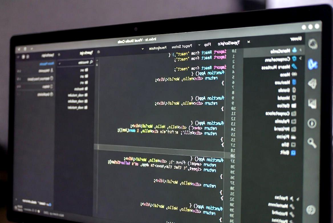 JavaScriptとHaskellの開発者人口や将来性を比較するプログラミング言語のイメージ